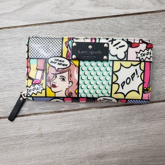 kate spade Handbags - KATE SPADE LACEY DAYCATION COMIC ZIP AROUND WALLET